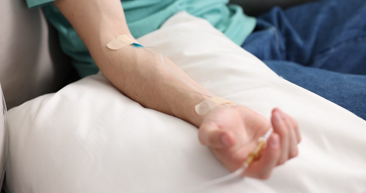 Is IV Therapy Safe? What the Evidence Shows and What to Ask Before You Book Physician reviewing a patient chart before an intravenous infusion at an orthopedic practice in Delray Beach