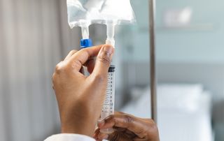 Comparison of oral supplement capsules and an intravenous infusion bag on a clinical counter