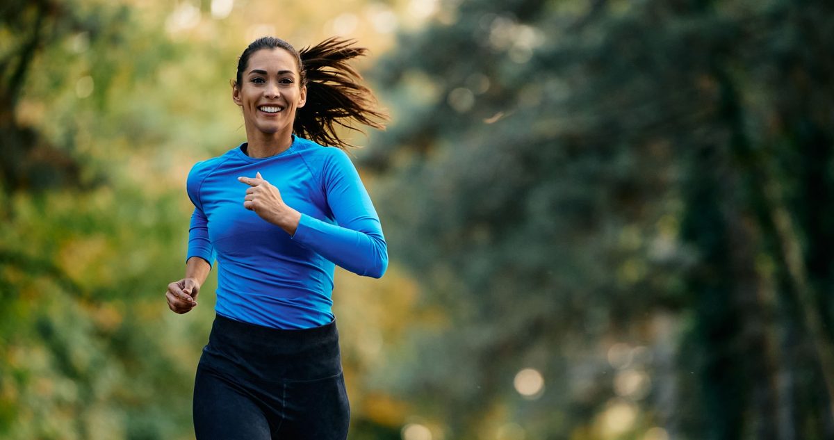 Runner back on a park path, returned to the activity joint pain had been interrupting.