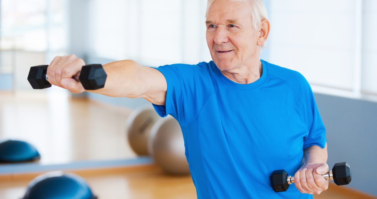 Shoulder Osteoarthritis: Treatment Options Beyond Surgery Older man raising a dumbbell to shoulder height in a gym, the kind of strengthening that keeps an arthritic shoulder moving.